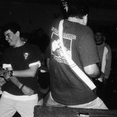 Greg jamming and Nick TP caught in a mosh.