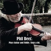 Plays Guitar And Fiddle Sings A Bit.