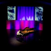 Stanton in concert with piano and multi-media visuals