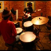 Edu Cesar on the Drums, André Peniche on the guitar