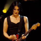 Molko in a dress on stage