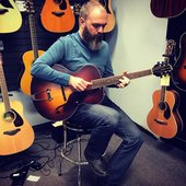 Test driving a sweet Gretsch archtop in now-defunct St. John's Music in Toronto