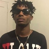 carti with a vlone tee