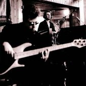 U2 as Passengers - Adam Clayton and Larry Mullen Jr. in the studio recording sessions, 1995. Pic by Anton Corbjin