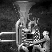 Charles Bobuck on stage for The Residents' Shadowland tour (2014.) Playing his own invention, The Garbletron…