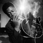b.b king in recording studio, smoking a cigarette