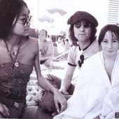 John lennon, his ex girlfriend *may pang* and julian lennon <3