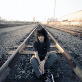 'sleeping on train tracks'