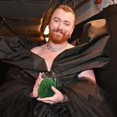Sam Smith stuns in ballgown to collect fashion award