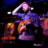 Christian Madden, Liam Frost and Richard Young performing with TOKOLOSH