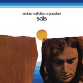 Seduto Sull'alba A Guardare