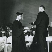 Harris Glenn Milstead receiving his high school diploma