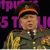 John Bird, as African Dictator