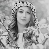 Dalal Abu Amneh wearing Palestinian kaffiyah