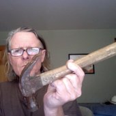 Michael Gira with a hammer