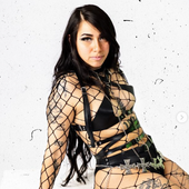 dangerousbeauty wearing fishnets and a belt.png
