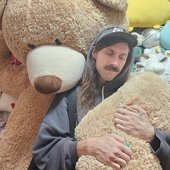 Brandon Michael with plushies