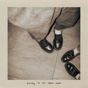 Image for 'sitting in an open room'