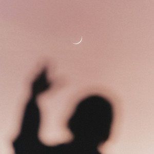“Lovers to Strangers”的封面