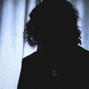 Image for 'Wounded Masquerade'