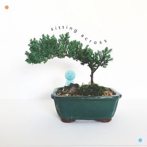 “Sitting Across”的封面