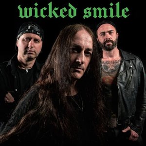 Bild för 'Wicked Smile'