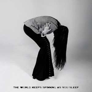 Immagine per 'the world keeps spinning as you sleep'